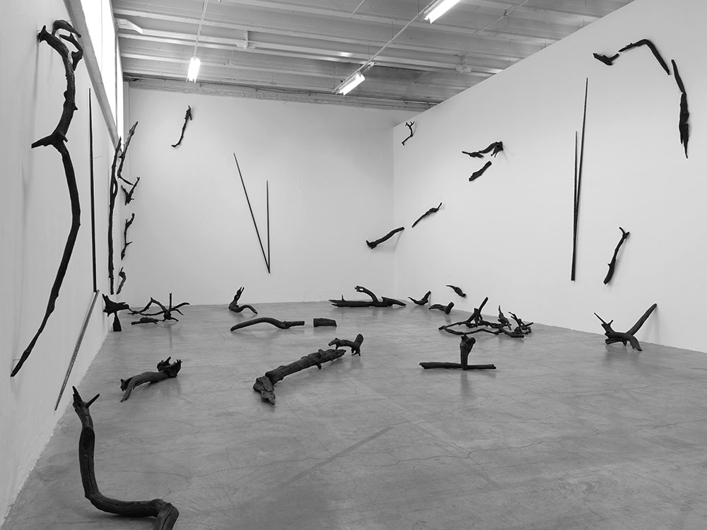 Round Midnight | 2016 Burnt and carved wood, ink, glass, dry ink | Installation view at Palais de Tokyo, Paris Photo: André Morin |© ADAGP, Paris 2017 Courtesy of the artist