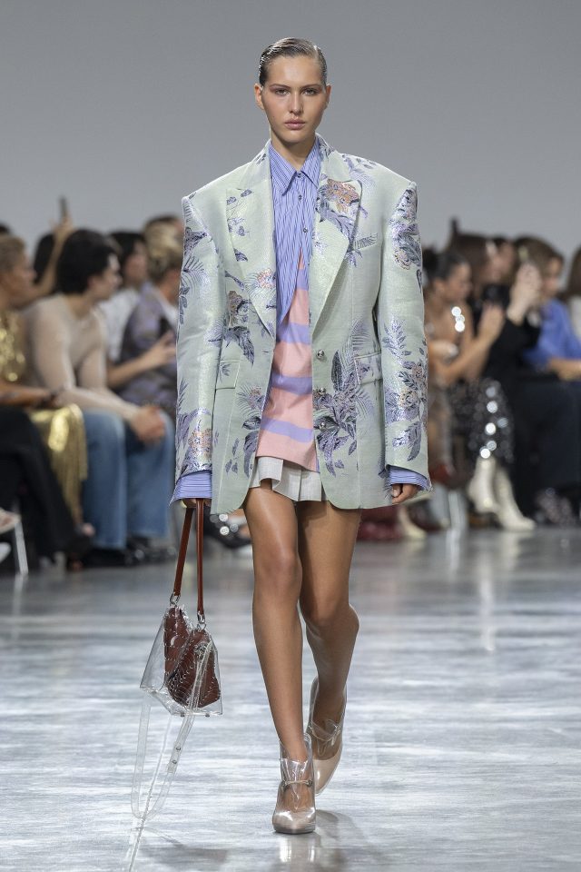 A model wearing an original creation from the womenswear spring summer 2025 ready to wear collections in Paris from the house of Rabanne