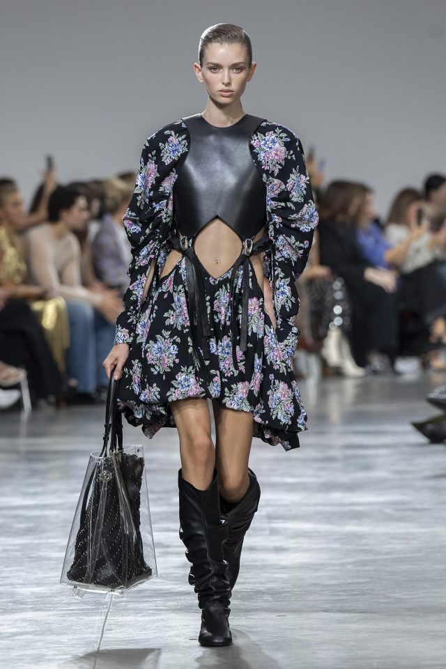 A model wearing an original creation from the womenswear spring summer 2025 ready to wear collections in Paris from the house of Rabanne