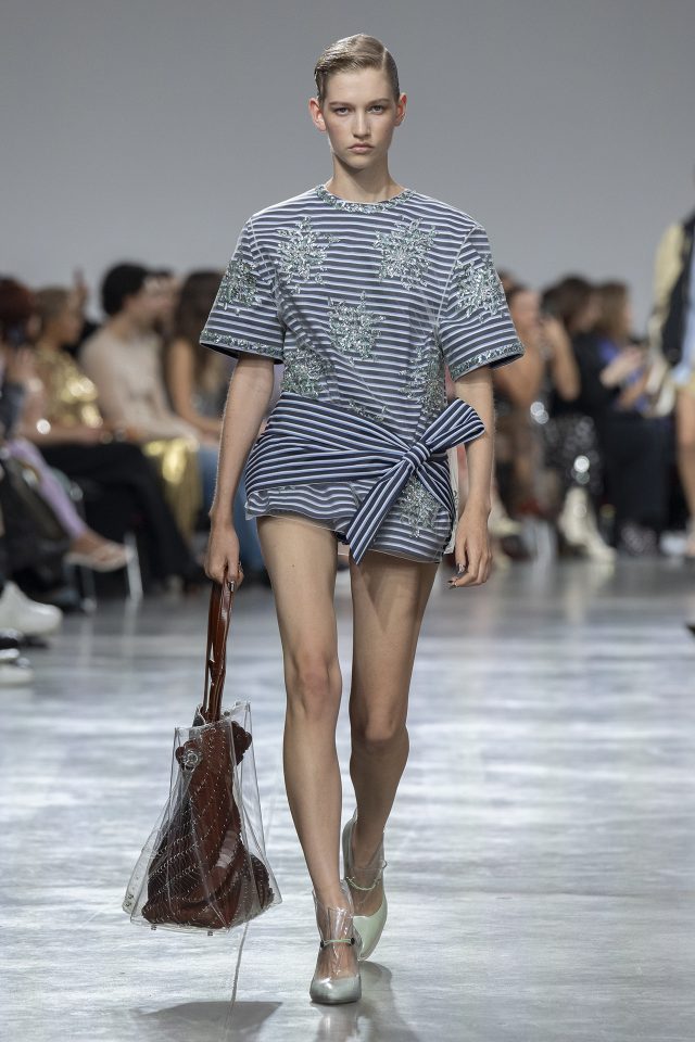 A model wearing an original creation from the womenswear spring summer 2025 ready to wear collections in Paris from the house of Rabanne