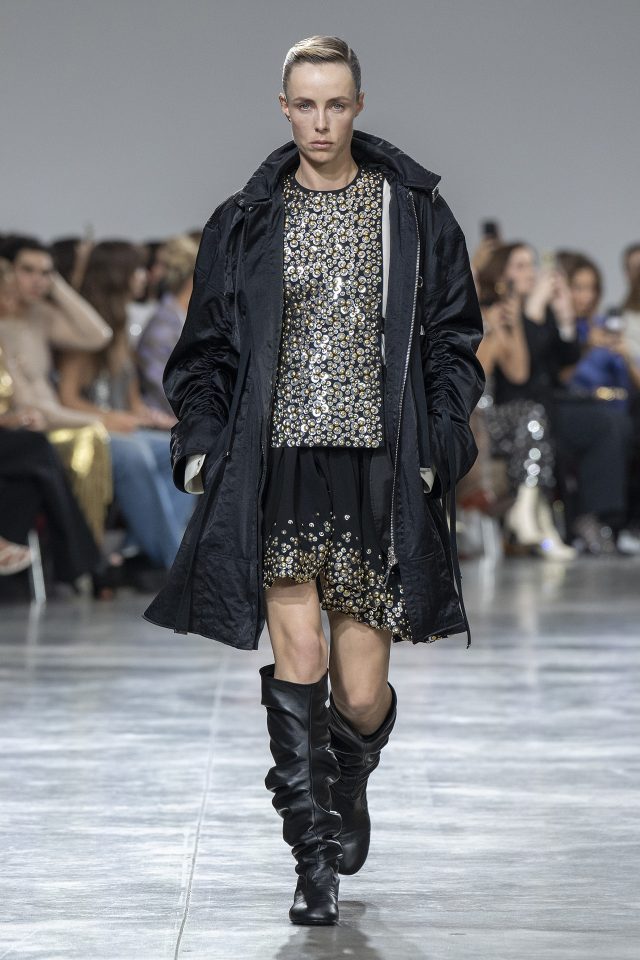 A model wearing an original creation from the womenswear spring summer 2025 ready to wear collections in Paris from the house of Rabanne