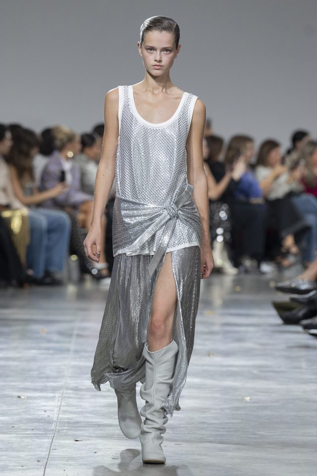 A model wearing an original creation from the womenswear spring summer 2025 ready to wear collections in Paris from the house of Rabanne