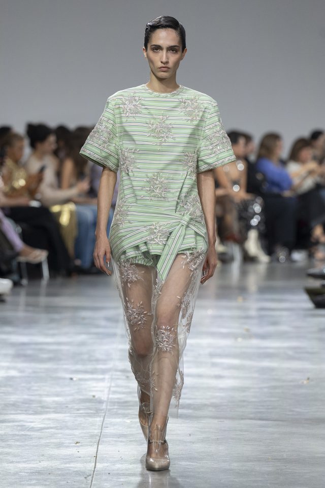 A model wearing an original creation from the womenswear spring summer 2025 ready to wear collections in Paris from the house of Rabanne