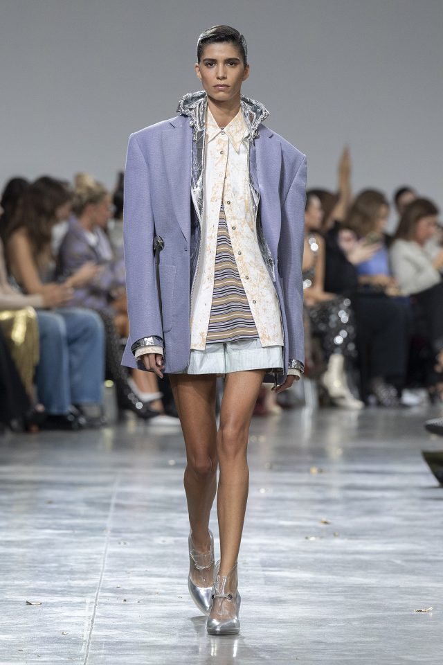 A model wearing an original creation from the womenswear spring summer 2025 ready to wear collections in Paris from the house of Rabanne